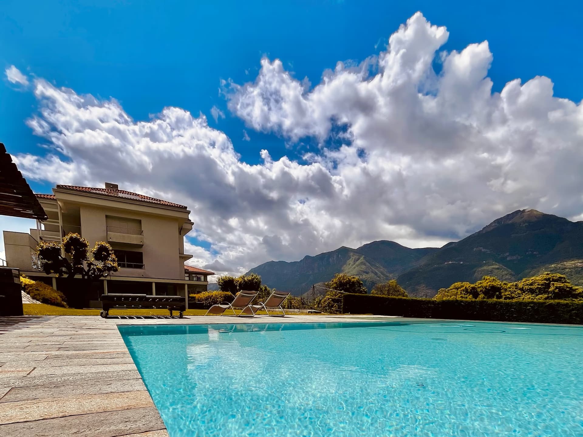 Infinity pool overlooking the Pre-Alps and Valle Camonica